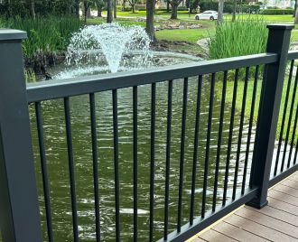 Custom black steel exterior railing installation for residential property in Austin, TX, featuring durable welded metal construction and modern design.