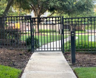 Professional steel fence and gate installation completed at a residential property in Austin, Texas featuring custom welded steel craftsmanship.